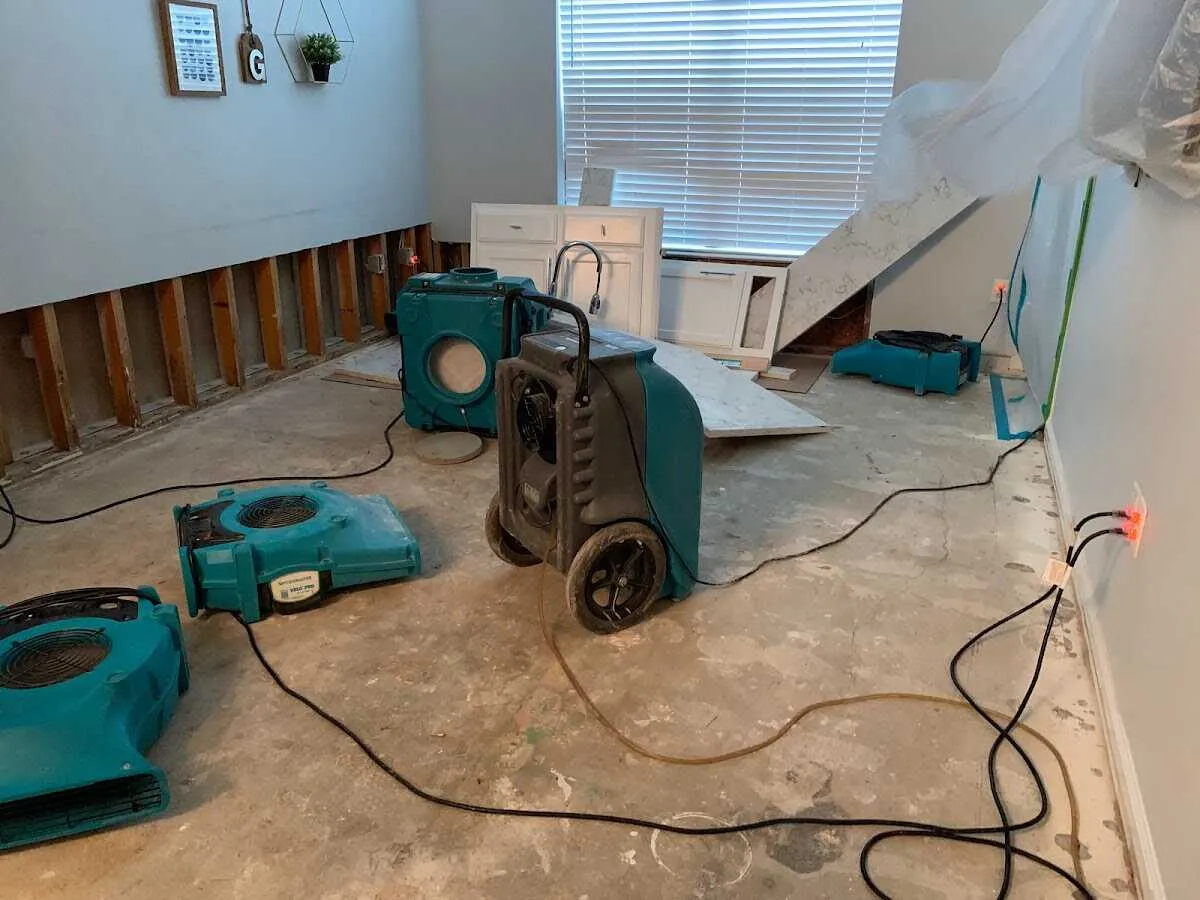 Dehumidifier in flood-cut room for Water Damage Restoration in Dunkirk